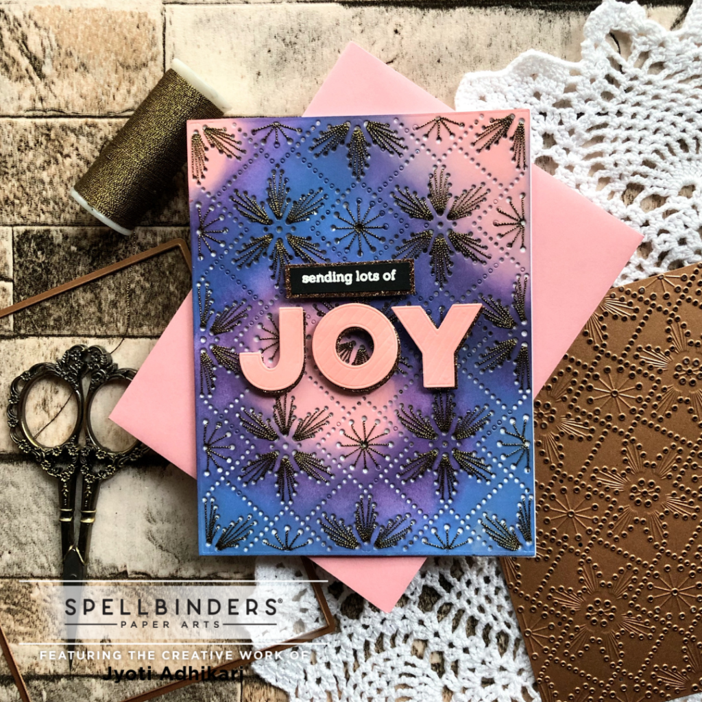 the front view of the card i created using the stitched petal background die from spellbinders' Stitchmas Christmas Collection July 2022
