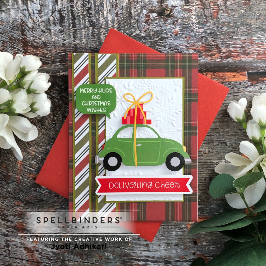 Merry Hugs Delivering Cheer card is created using the Oh what fun printed die cut pack from spellbinders.